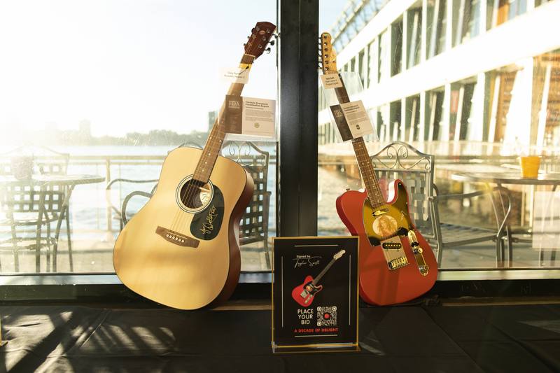 A silent auction lot on display before the doors opened at A Decade of Delight — photo 3 of 10.